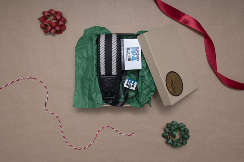 camera strap, pin badge and 35mm in a gift box